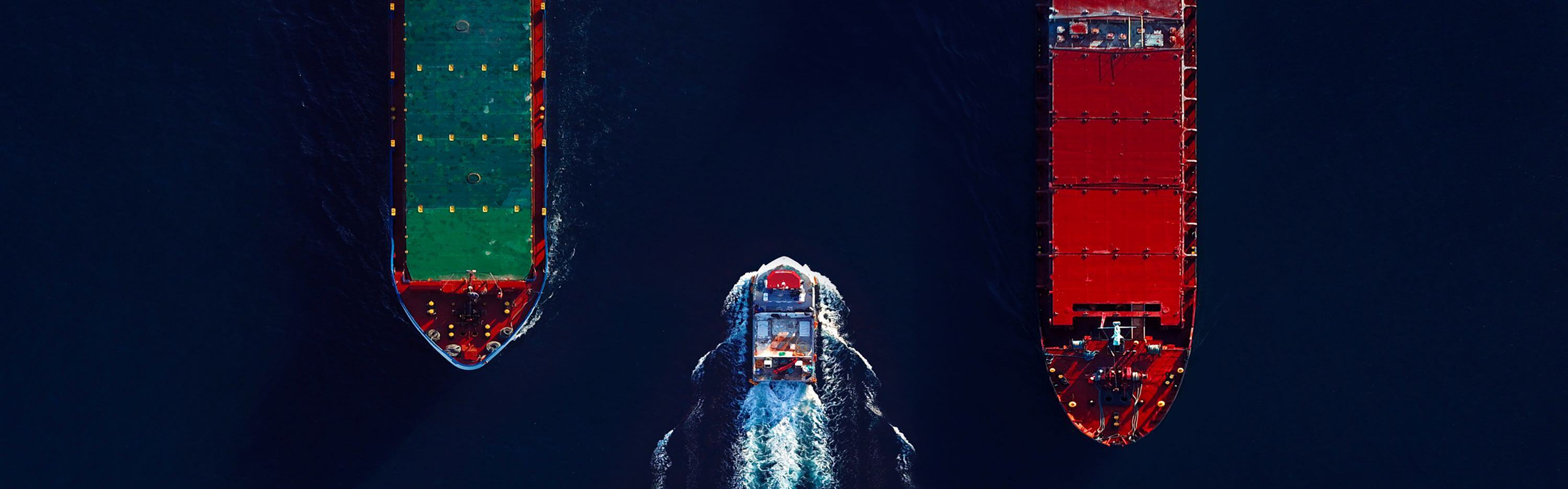 Ships navigating through dark waters